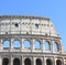 Great Colosseum in Rome, Italy, Europe. Roman Coliseum close-up with clear blue sky.