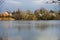 A great cormorant takes off over Biesdorfer Baggersee lake in January. Berlin, Germany