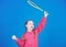 Great day to play. Athlete kid tennis racket on blue background. Active leisure and hobby. Tennis sport and