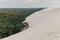 The Great Dune of Pyla also called Grande Dune du Pilat, the tallest sand dune in Europe invading the pine forest. Arcachon Bay,