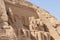 The great entrance of Abou Simbel temple in Egypt with huge statues in the doorway