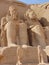 The great entrance of Abou Simbel temple in Egypt with huge statues in the doorway