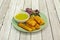 Great fried yucca chunks with guacamole sauce to dip with red onion