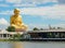 The Great Golden statue Monk at Puttha Utthayan Maharat Buddha Park