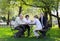 Great-grandfather, grandfather, father and son wrestling