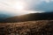 Great hills at frozen morning on Carpathian mountains with sunrise