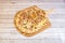 Great image of Italian carbonara recipe pizza with a lot of melted cheese, many slices of fresh mushroom
