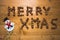 A great inscription â€œMerry Xmasâ€ created from nuts