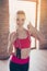 Great job! Happy young sportwoman in stylish training outfit wit