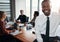 Great leaders inspire greatness in their team. Portrait of a confident businessman sitting in an office with his