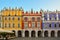 Great Market Square, Zamosc, Poland - September, 21, 2018: Multicolored facades of historic buildings on Great Market Square in