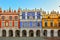 Great Market Square, Zamosc, Poland - September, 21, 2018: Multicolored facades of historic buildings on Great Market Square in