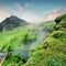 Great morning view of Skogafoss Waterfall on Skoga river. Splendid summer scene of Iceland, Europe. Beauty of nature concept