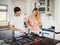 Great mornings are made with love and food. a happy young couple cooking breakfast together at home.