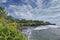 Great nature view of a beach in Tanah Lot Bali with heavy waves hitting the beach