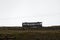 Great Orme Tramway along landscape, white sky, tramlines