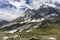 The great peaks of the Mont Blanc massif between the clouds. Alp