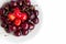 The great plate of cherries on a white background