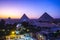 Great Pyramid of Giza illuminated at night, UNESCO World Heritage site, Cairo, Egypt.