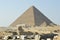 The great pyramid of Giza and a side profile of the Sphinx, Khufu pyramid in the the pyramids desert in Egypt