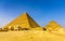 The Great Pyramid of Giza and smaller Pyramid of Henutsen