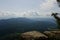 Great scenic view of a green valley in Catalonia landscape from the top a rock cliff hill