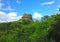 Great Sigiriya big rock in green forest