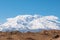 Great snow-capped mountain peak of Mount Muztag Ata on the Pamirs Plateau