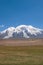 Great snow-capped mountain peak of Mount Muztag Ata on the Pamirs Plateau