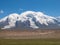 Great snow-capped mountain peak of Mount Muztag Ata on the Pamirs Plateau