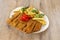 Great Spanish recipe for cachopo with red piquillo peppers, homemade chips