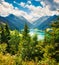 Great summer scene of Speicher Durlassboden lake. Picturesque morning view of Richterspitze mountain range in the Austrian Alps,