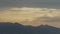 Great sunset over the misty mountains with dramatic clouds / timelapse