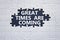 Great times are coming symbol. Concept words Great times are coming on white puzzle. Beautiful black background. Business and