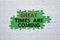 Great times are coming symbol. Concept words Great times are coming on white puzzle. Beautiful green background. Business and