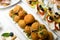 great view of falafel balls with parsley on a plate