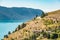 Great view of Kalamalka lake in British Columbia, Canada. Large luxury house on the lake shore with view on the water and mountain