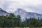 Great vistas of massive granite monoliths Half Dome seen from Yosemite Valley floor in Yosemite National Park, California