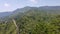 Great Wall of China in a green forest landscape at Mutianyu in Huairou District near Beijing, China.