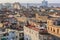 Great wide open view of old antique Cuban authentic Havana city against ocean and sky background at sunset time