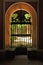 Great window open to the garden at the Casa de Pilatos Palace in Seville, Spain