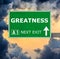 GREATNESS road sign against clear blue sky