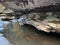 Greaves Creek undercutting a cliff face on the Grand Canyon Track in the Blue Mountains