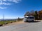 A Grech Strada Camper Van parked in an overlook in the Blue Ridge Mountains in North Carolina during the Autumn with leave in