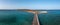 Greece. Aerial view over Kythira Diakofti bridge going to island harbor, blue sky and sea