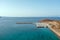 Greece. Aerial view over Kythira island harbor at Diakofti, blue sky and sea, sunny summer day