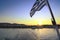 Greece, Anti Paros.  The Greek flag at sunset.