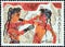 GREECE - CIRCA 1973: A stamp printed in Greece shows boxing boys fresco, circa 1973.