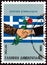 GREECE - CIRCA 1990: A stamp printed in Greece shows Clasped Hands, Roses and Flag, circa 1990.