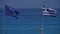 Greece and European Union Flags Image with Blue Water Sea in Background